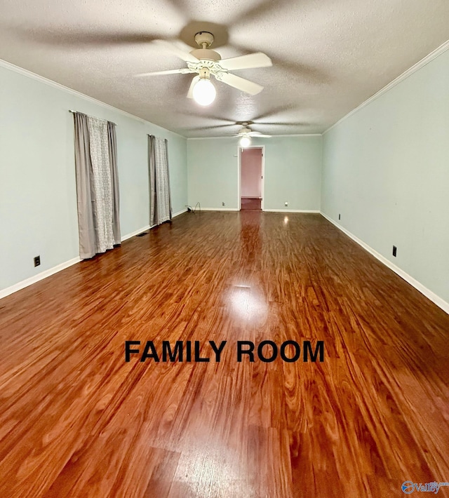 unfurnished room with ornamental molding, hardwood / wood-style floors, ceiling fan, and a textured ceiling