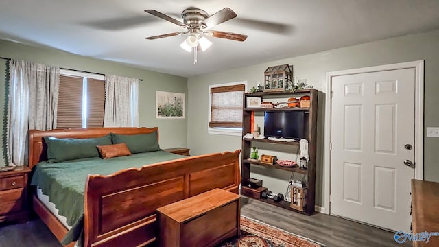 bedroom featuring wood-type flooring and ceiling fan