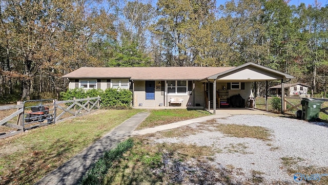 single story home with a carport