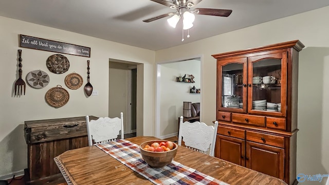 dining room featuring hardwood / wood-style floors and ceiling fan