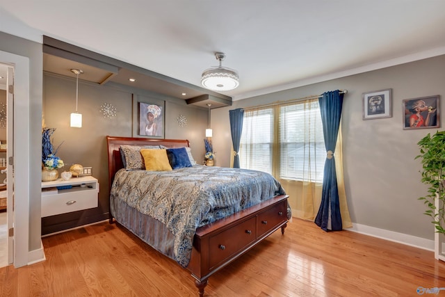 bedroom with light hardwood / wood-style floors