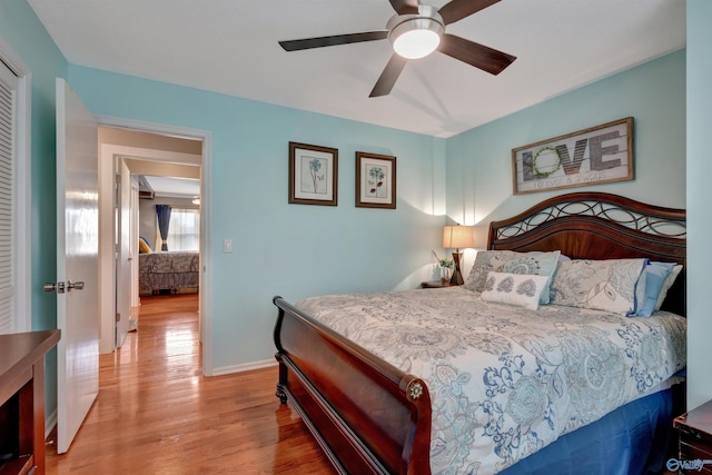 bedroom featuring ceiling fan and light hardwood / wood-style flooring