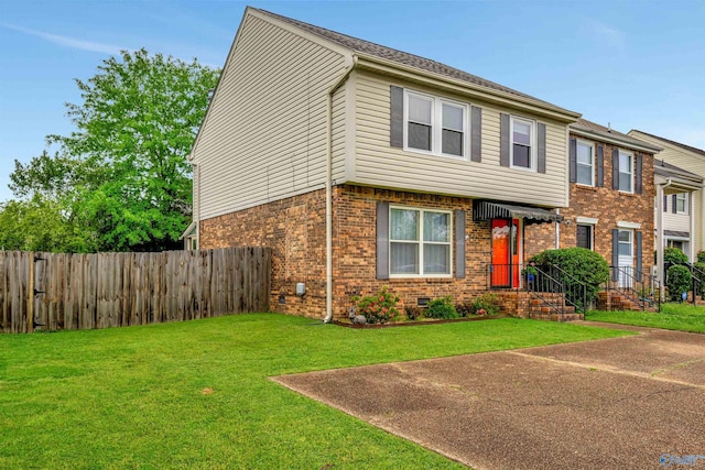 view of front of house with a front lawn