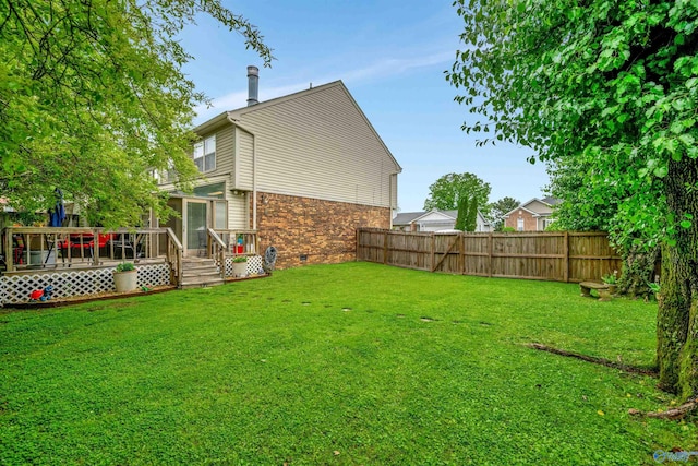 view of yard with a deck