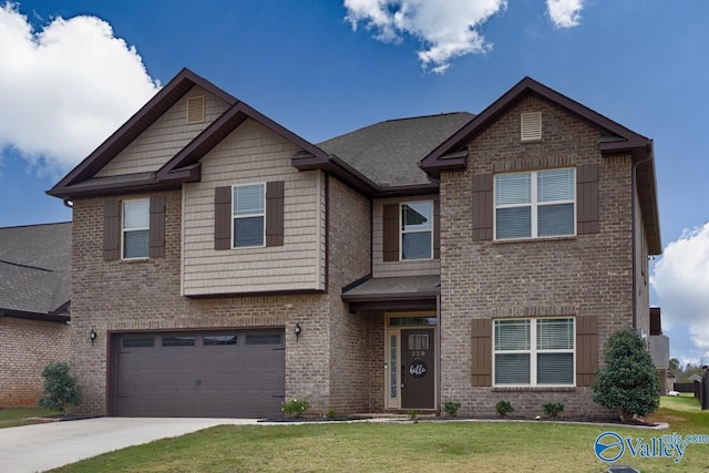 craftsman inspired home featuring a front lawn and a garage