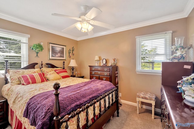 bedroom featuring ornamental molding, carpet floors, and ceiling fan