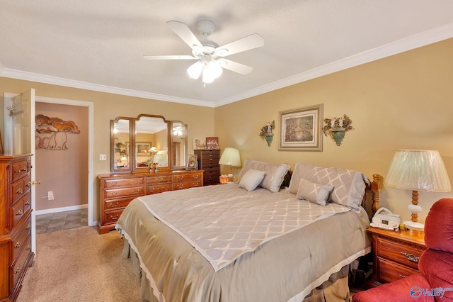 carpeted bedroom featuring ornamental molding and ceiling fan