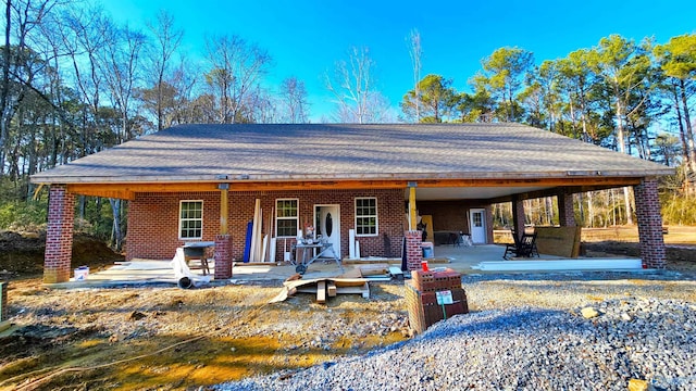 view of front facade with a patio area