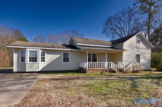 ranch-style home with covered porch