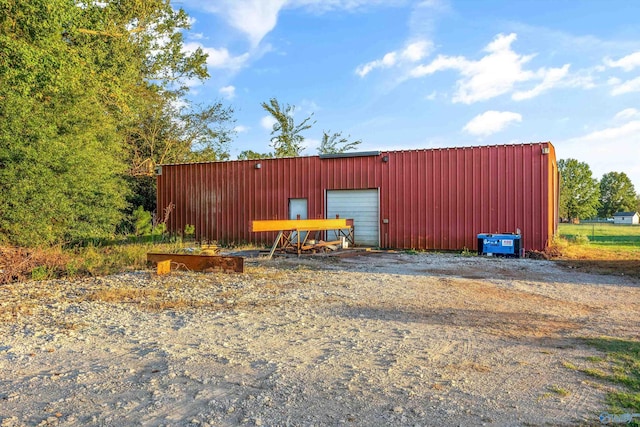 view of outdoor structure featuring a garage