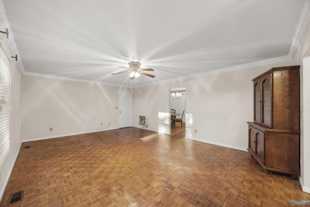 unfurnished living room featuring ceiling fan with notable chandelier, dark parquet floors, and plenty of natural light