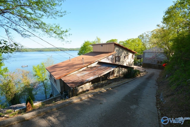 dock area with a water view