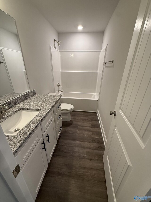 301 Carnation Ave, Meridianville, AL 35759 - full bath featuring vanity,  shower combination, wood finished floors, and toilet