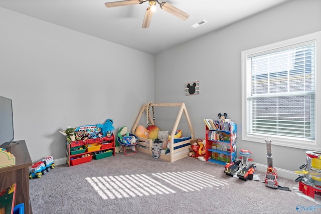 playroom with carpet flooring and ceiling fan