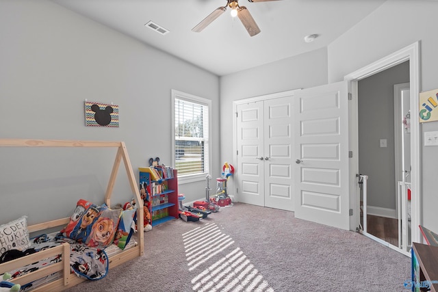 rec room with carpet flooring and ceiling fan