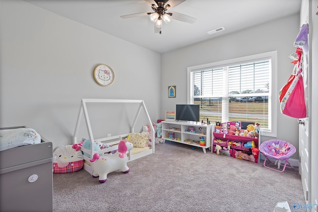 playroom featuring carpet flooring and ceiling fan