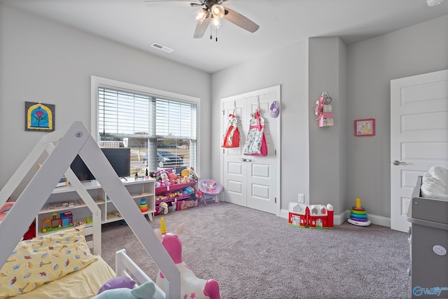 recreation room with carpet flooring and ceiling fan