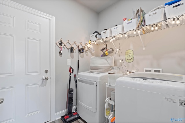 laundry area featuring separate washer and dryer