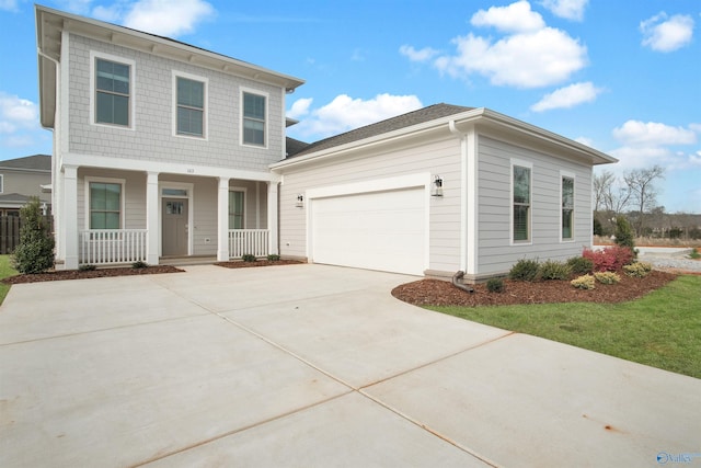 106 Kite Cir, Madison, AL 35756 - view of front of property featuring covered porch, driveway, and a garage