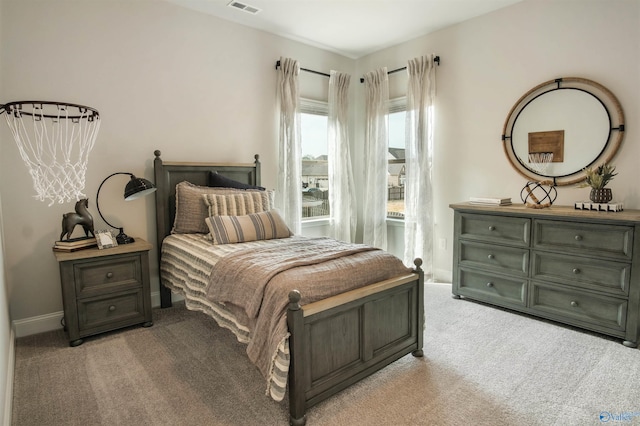 106 Kite Cir, Madison, AL 35756 - bedroom featuring light colored carpet and baseboards