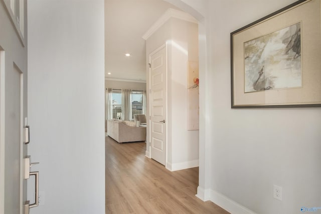 106 Kite Cir, Madison, AL 35756 - hall with arched walkways, ornamental molding, light wood-style flooring, and recessed lighting