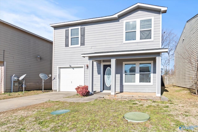 front of property featuring covered porch, a garage, and a front lawn