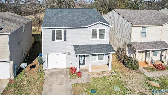 view of front property with a front yard and a garage