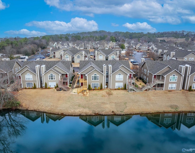 drone / aerial view featuring a water view