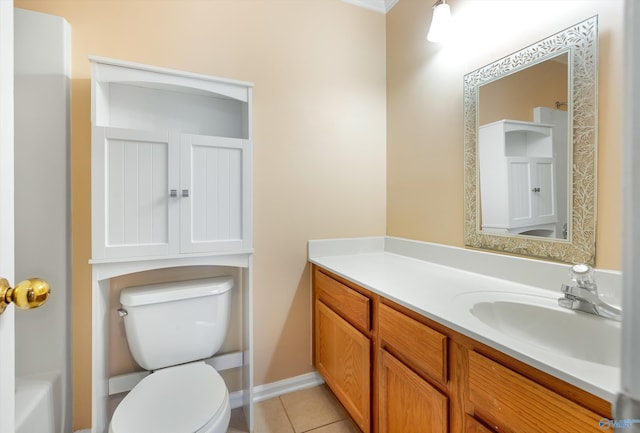 bathroom featuring tile patterned floors, vanity, and toilet