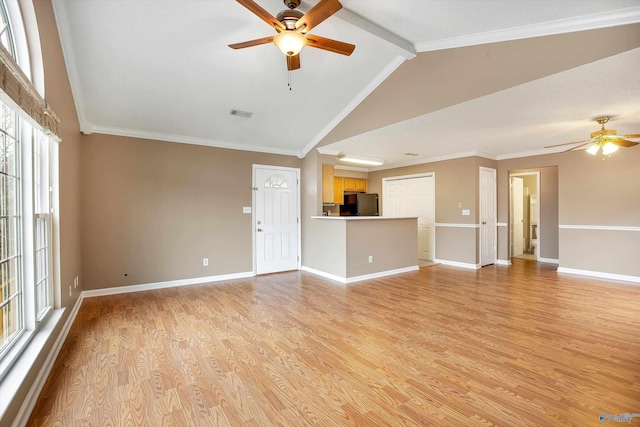 unfurnished living room with ornamental molding, light hardwood / wood-style flooring, lofted ceiling with beams, and ceiling fan