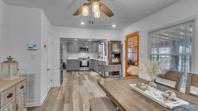 111 Althea St, Gadsden, AL 35904 - dining area with ceiling fan, light wood-type flooring, recessed lighting, and baseboards