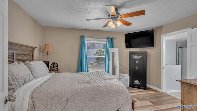 111 Althea St, Gadsden, AL 35904 - bedroom featuring light wood finished floors, a textured ceiling, ceiling fan, and baseboards
