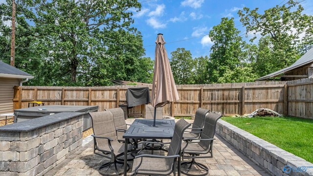 111 Althea St, Gadsden, AL 35904 - fenced backyard featuring outdoor dining area and a patio