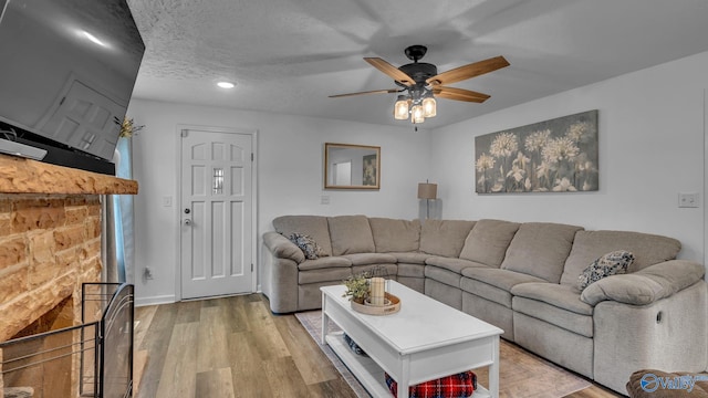 111 Althea St, Gadsden, AL 35904 - living area with a ceiling fan, light wood-style flooring, recessed lighting, and baseboards
