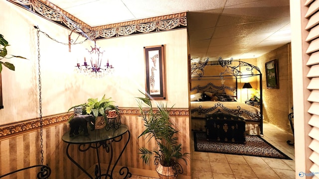 hallway with tile patterned flooring