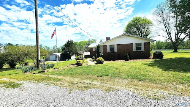 exterior space with a yard