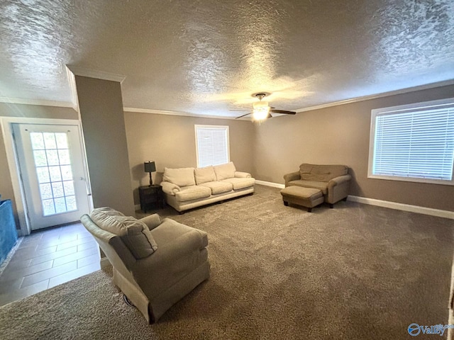 living room featuring carpet, ornamental molding, and a textured ceiling