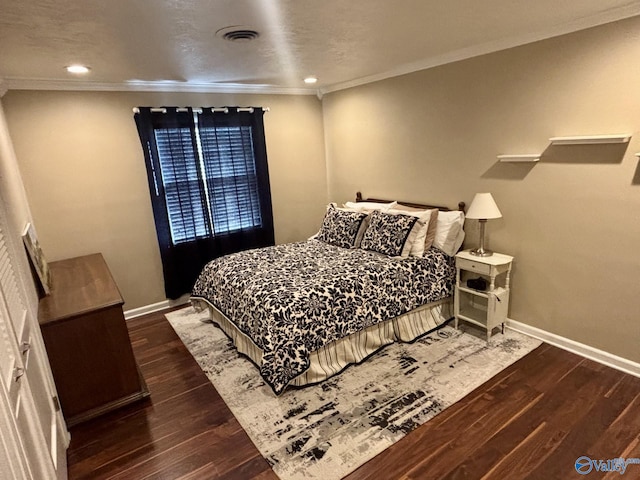 bedroom featuring dark wood-type flooring and ornamental molding