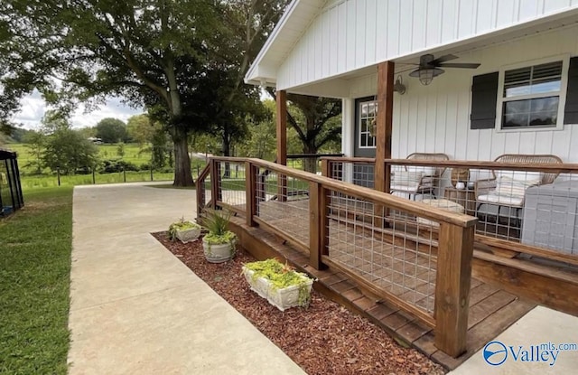 wooden deck with ceiling fan