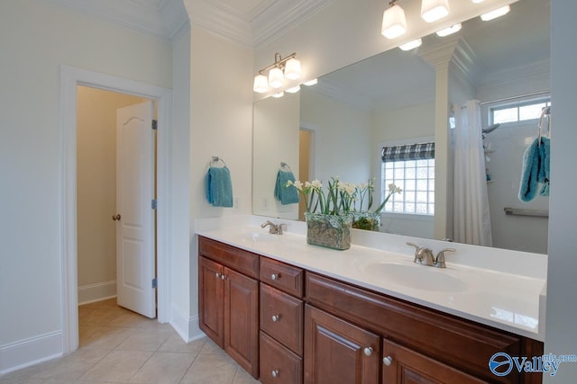 full bath featuring double vanity, tile patterned floors, a sink, and crown molding