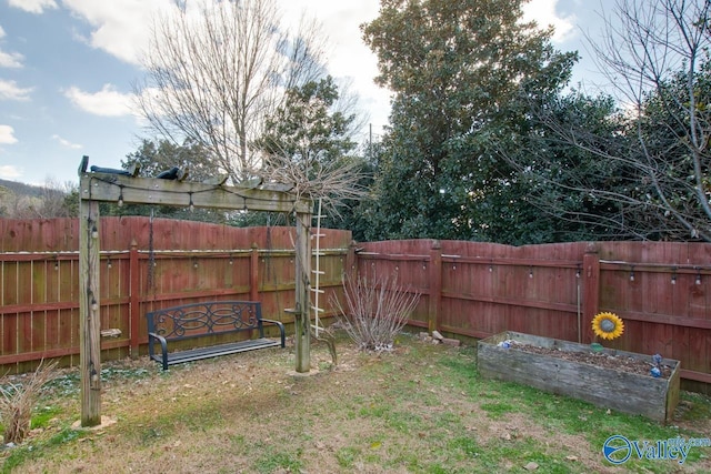 view of yard featuring a fenced backyard