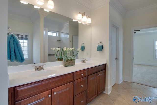 full bath with crown molding, a sink, and tile patterned floors