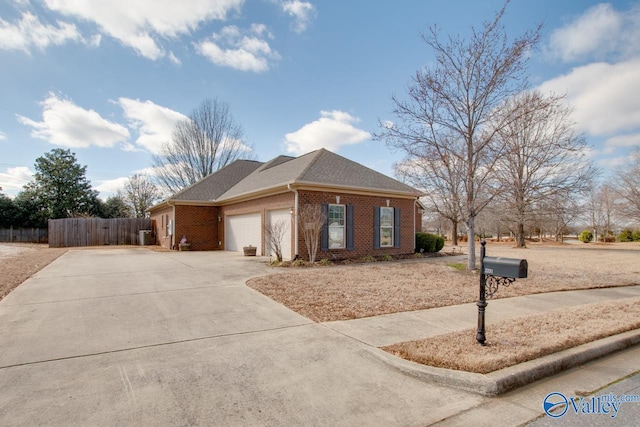 ranch-style house featuring an attached garage, brick siding, a shingled roof, fence, and driveway