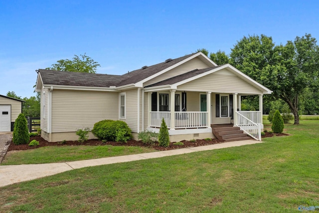 265 Dorning Rd, Harvest, AL 35749 - view of front of home featuring covered porch, a front lawn, and a shingled roof