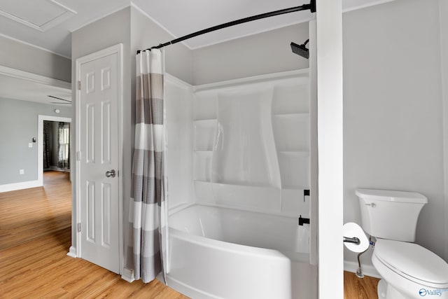 265 Dorning Rd, Harvest, AL 35749 - full bath featuring wood finished floors, toilet, shower / tub combo with curtain, and baseboards