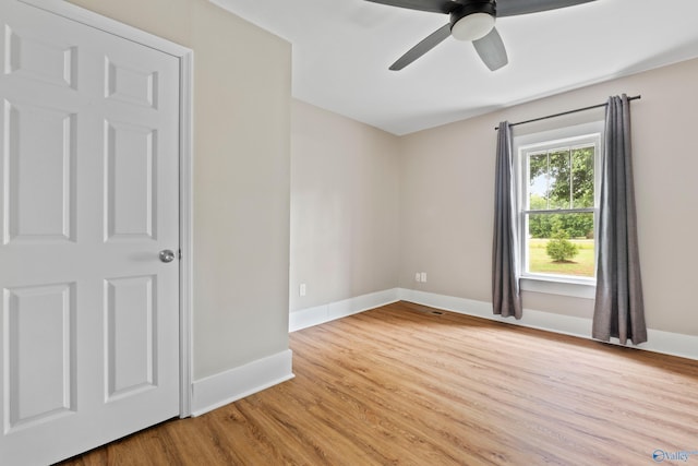 265 Dorning Rd, Harvest, AL 35749 - unfurnished bedroom with baseboards, light wood-style flooring, and ceiling fan