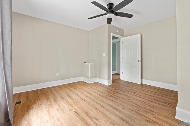 265 Dorning Rd, Harvest, AL 35749 - unfurnished bedroom featuring wood finished floors, baseboards, and ceiling fan