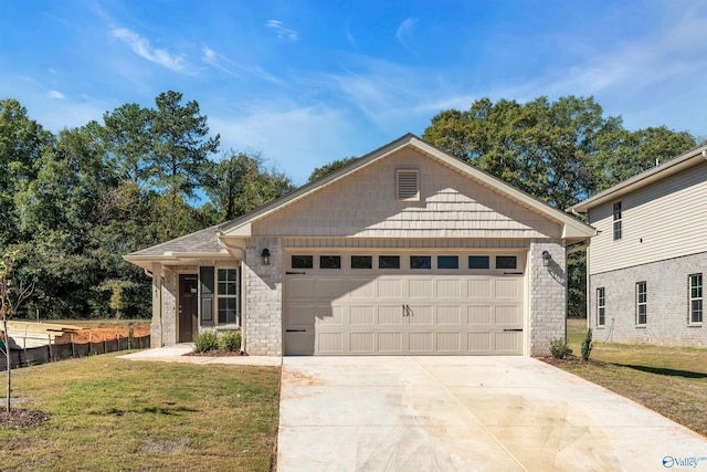 ranch-style house with a front lawn and a garage