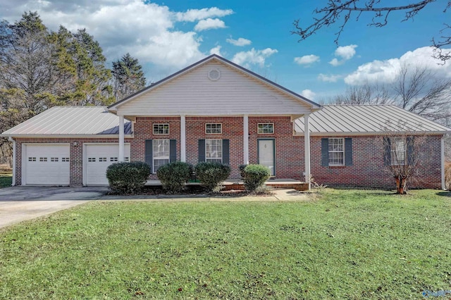 ranch-style home featuring a front lawn and a garage