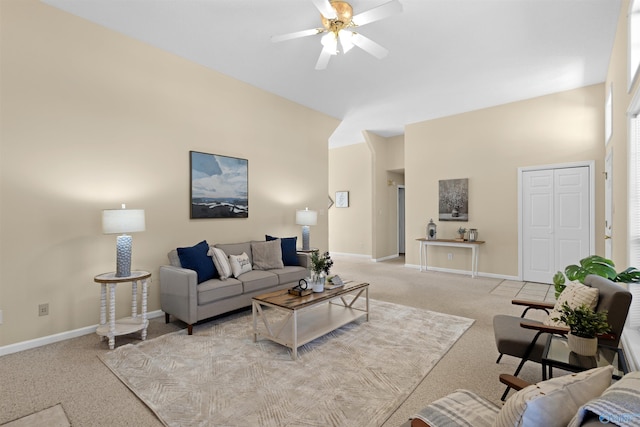 living room featuring ceiling fan and light carpet